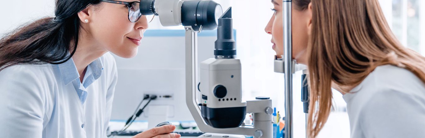 Woman receiving an eye exam