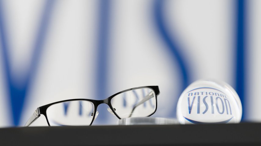 National Vision logo through glasses lens