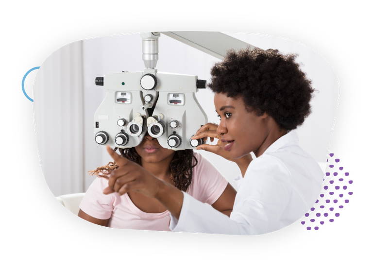 doctor performing eye exam
