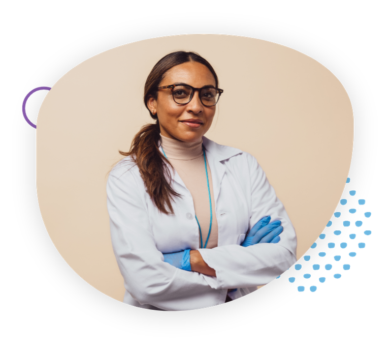 woman in white lab coat wearing glasses